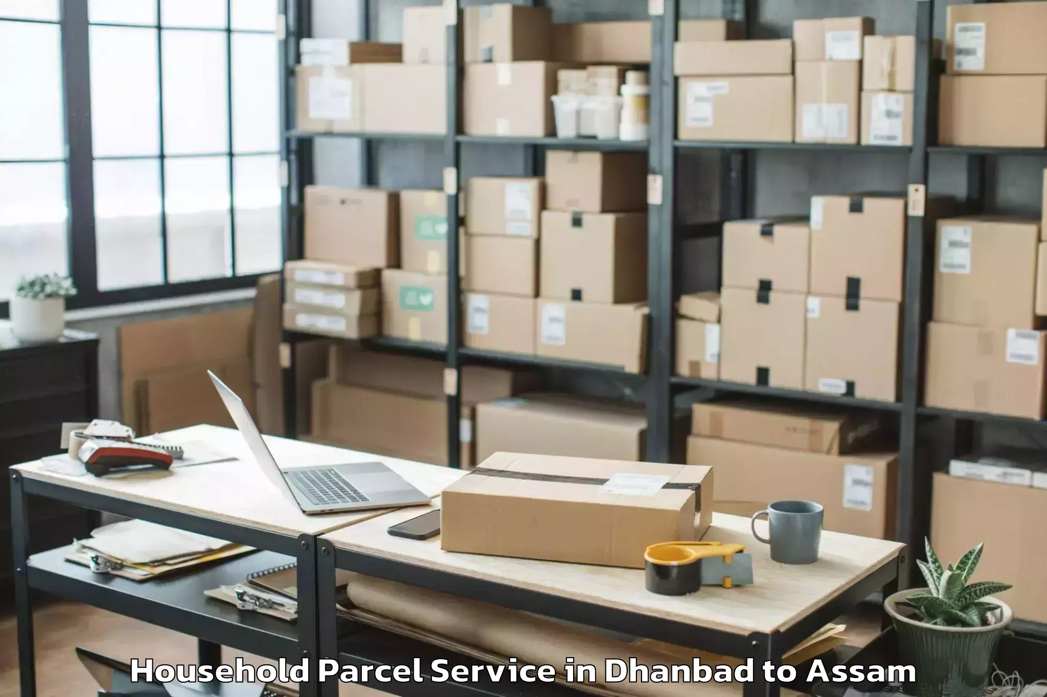 Reliable Dhanbad to Kangku Household Parcel